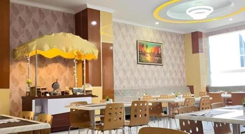 Χώρος καθιστικού στο Sindoro Hotel Cilacap By Conary