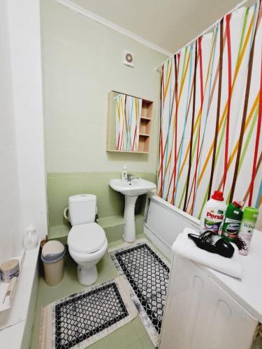 Koupelna v ubytování 3-х комнатная квартира в золотом квадрате столицы