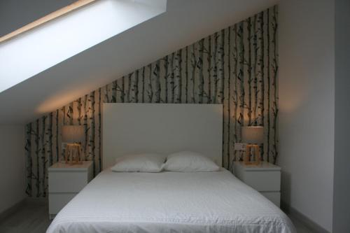 Un pat sau paturi într-o cameră la Pensión El Ansar