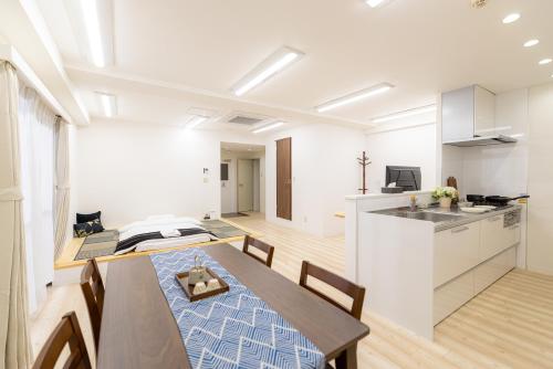 Kuchyň nebo kuchyňský kout v ubytování 匯金中葛西ビル