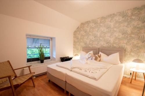 Voodi või voodid majutusasutuse Elbe52 - by BohnApartments- Nähe Elbe- WLAN- Parken toas