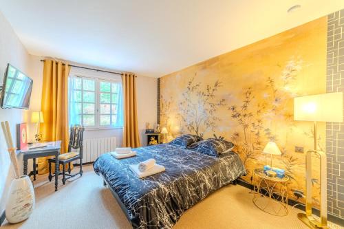 Ένα ή περισσότερα κρεβάτια σε δωμάτιο στο Bruyère et Charmes de Bourgogne