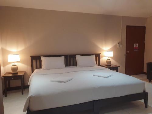 Postel nebo postele na pokoji v ubytování Townhouse PK Garden