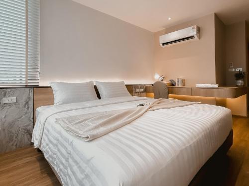 Postel nebo postele na pokoji v ubytování Townhouse PK Garden