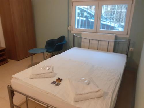 Postel nebo postele na pokoji v ubytování Blue central studio