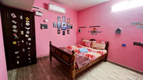 Postel nebo postele na pokoji v ubytování Maison De Ravi