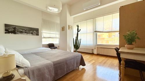 Postel nebo postele na pokoji v ubytování Bilocale in centro, con vista mare e Rotonda