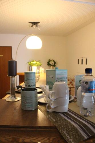 a table with a bunch of products on it at Waldpension Bielefeld in Bielefeld