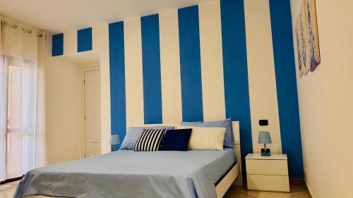 Кровать или кровати в номере BEB Satriani Room