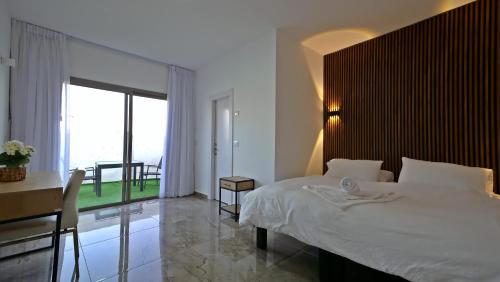 Postel nebo postele na pokoji v ubytování אחוזת חושן