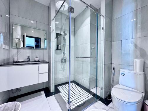 a bathroom with a shower and a toilet and a sink at Title Legendary 7 floor Mountain View in Bang Tao Beach