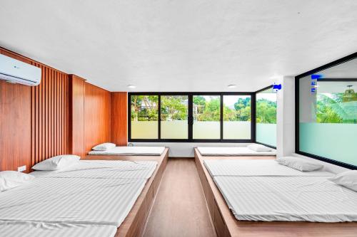 Postel nebo postele na pokoji v ubytování Hoa An Viên Villa