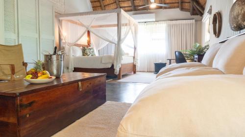 Ένα ή περισσότερα κρεβάτια σε δωμάτιο στο Vida Nova Kruger