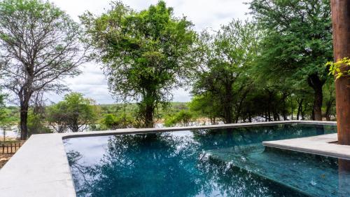 Πισίνα στο ή κοντά στο Vida Nova Kruger