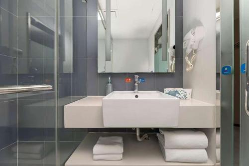 Ένα μπάνιο στο Hanting Hotel Nanjing Jiangning Niu Shoushan