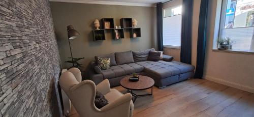 Χώρος καθιστικού στο XXL Cosy apartments Villa Goisern, centre with mountain view