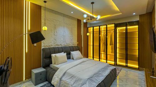 Ένα ή περισσότερα κρεβάτια σε δωμάτιο στο Nex Home Apartment