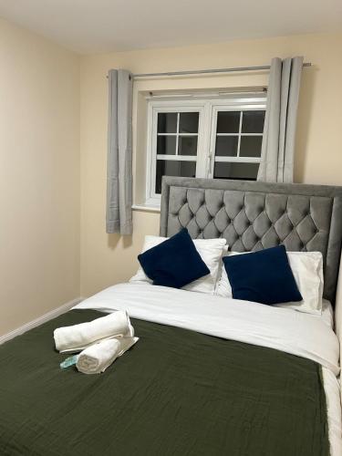 En eller flere senge i et værelse på The Cosy Geordie