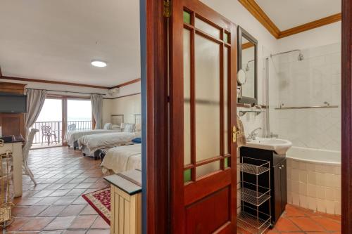 Postel nebo postele na pokoji v ubytování Berg en Zee Guesthouse