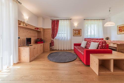 TV a/nebo společenská místnost v ubytování Dolomites Essence