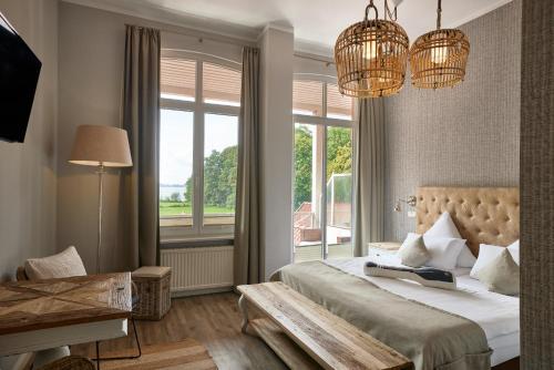 Postel nebo postele na pokoji v ubytování Das 53°Hotel