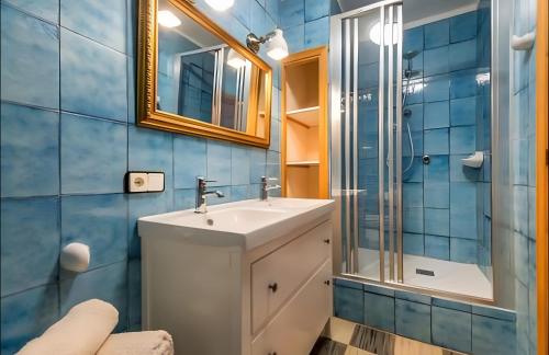 a bathroom with a sink and a shower at Sant Miquel in Campanet