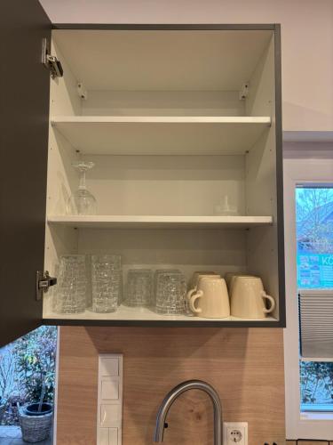 Η κουζίνα ή μικρή κουζίνα στο LA-Hüttenfeld Erdgeschoss Apartment