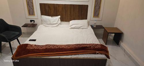 Ένα ή περισσότερα κρεβάτια σε δωμάτιο στο Hotel O Elysian