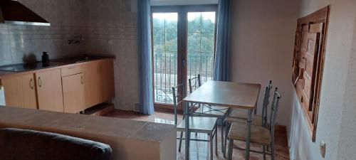 Køkken eller tekøkken på Apartamentos Turísticos San Cristóbal by Bossh! Hotels