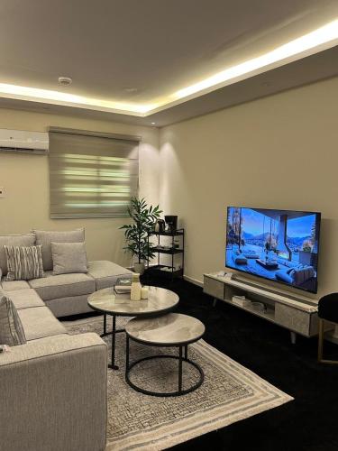 Et tv og/eller underholdning på شقة سكنية خاصة غرفتين نوم وصالة أنيقه