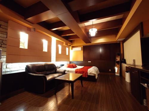 Posezení v ubytování ホテル カーシュ Cache 男塾ホテルグループ