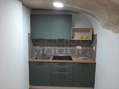 Kuchyň nebo kuchyňský kout v ubytování Tropea Belle Époque