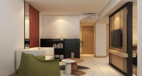 Televiisor ja/või meelelahutuskeskus majutusasutuses MAXONE Hotel Batam