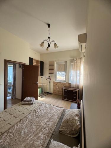 Postel nebo postele na pokoji v ubytování Лукс апартамент Базилика отделен вход