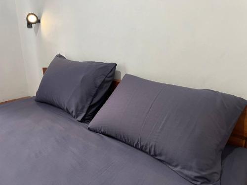 Ένα ή περισσότερα κρεβάτια σε δωμάτιο στο Kali Code Home