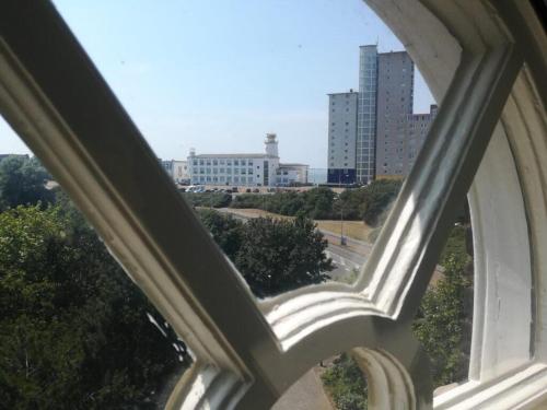 a view of a city from a window at Watertoren Vlissingen in Vlissingen