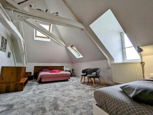 Ένα ή περισσότερα κρεβάτια σε δωμάτιο στο Château Raoul