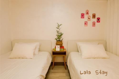 Postel nebo postele na pokoji v ubytování Lala Stay