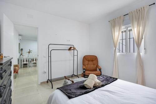 Кровать или кровати в номере Palo Cortado 16