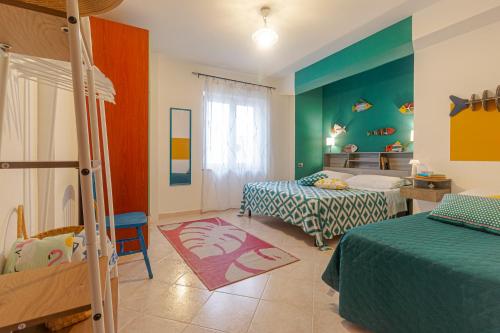 Ένα ή περισσότερα κρεβάτια σε δωμάτιο στο Casa Anita-relax e comodità