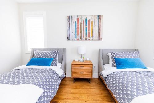 En eller flere senge i et værelse på Sauna, Hot Tub & Heated Pool Blue Mountain Getaway