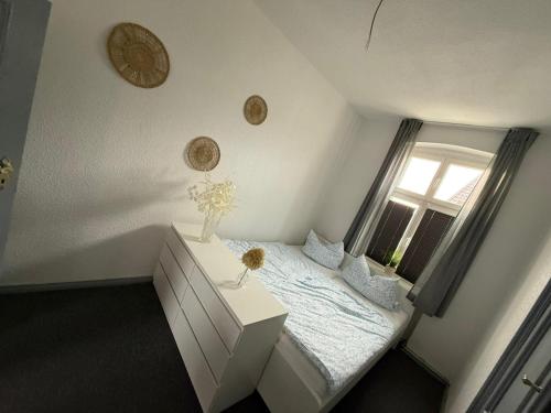 Ένα ή περισσότερα κρεβάτια σε δωμάτιο στο Ferienwohnung ab sofort