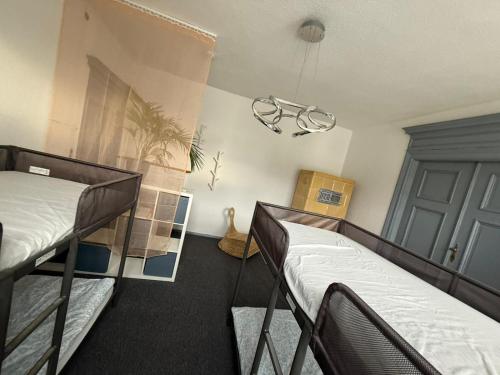 Ένα ή περισσότερα κρεβάτια σε δωμάτιο στο Ferienwohnung ab sofort