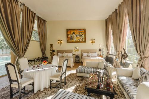 Χώρος καθιστικού στο Le Palais Rhoul and Spa