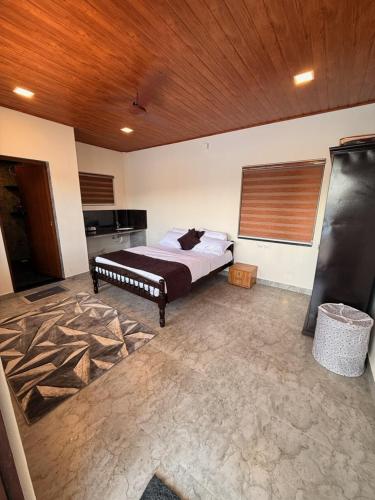 Giường trong phòng chung tại Tusker & Gaur - Bandipur