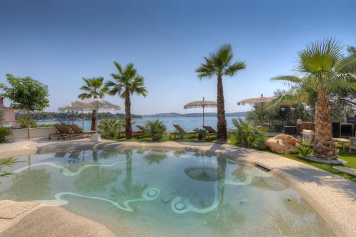 Palmezzo Beachfront Suites with Heated Pool