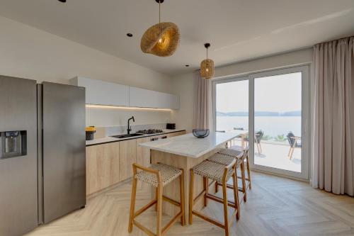 Palmezzo Beachfront Suites with Heated Pool
