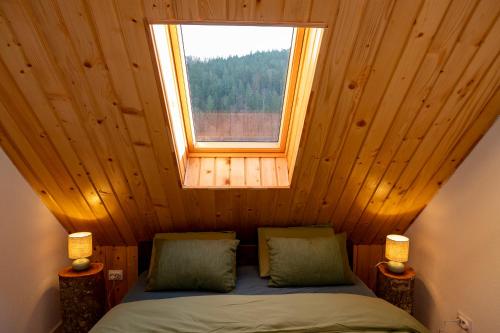 Postel nebo postele na pokoji v ubytování Chalet M2