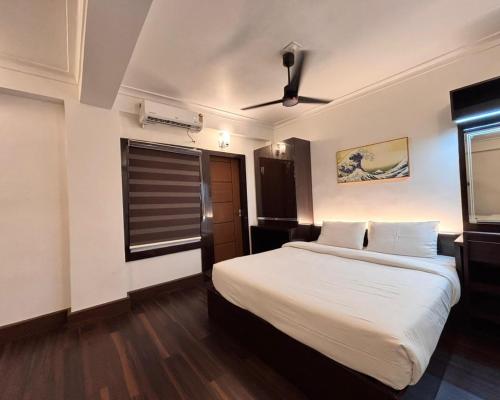 Postel nebo postele na pokoji v ubytování Luxe Style Hotels