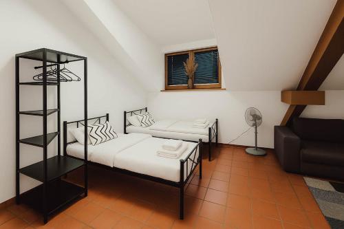 Postel nebo postele na pokoji v ubytování Central Living Apartments